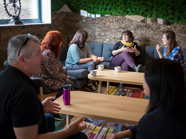 A group of people having a discussion.