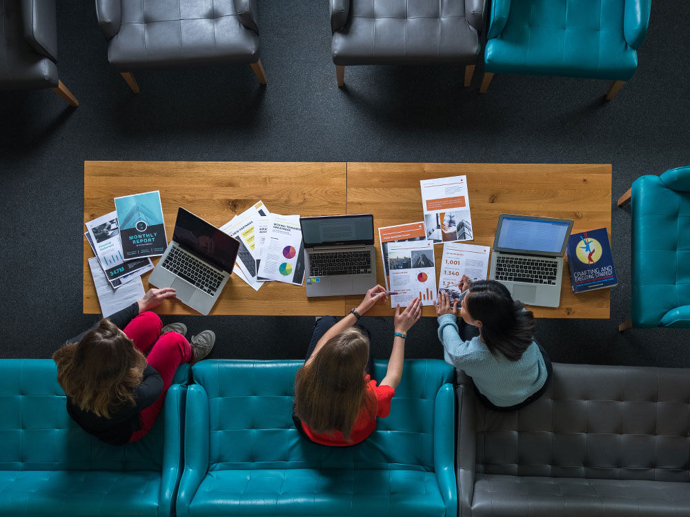 Team at a table discussing strategy