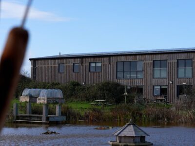 Outside shot of St. Eval Candle Company, showing the pond.