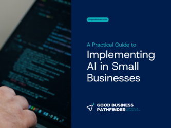 hand and laptop with coding